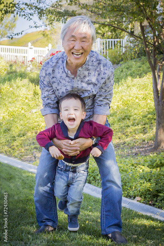 Chinese Grandpa Having Fun ...