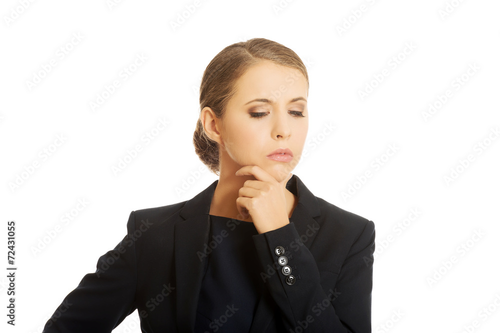 Businesswoman thinking about an idea Businesswoman thinking about an idea