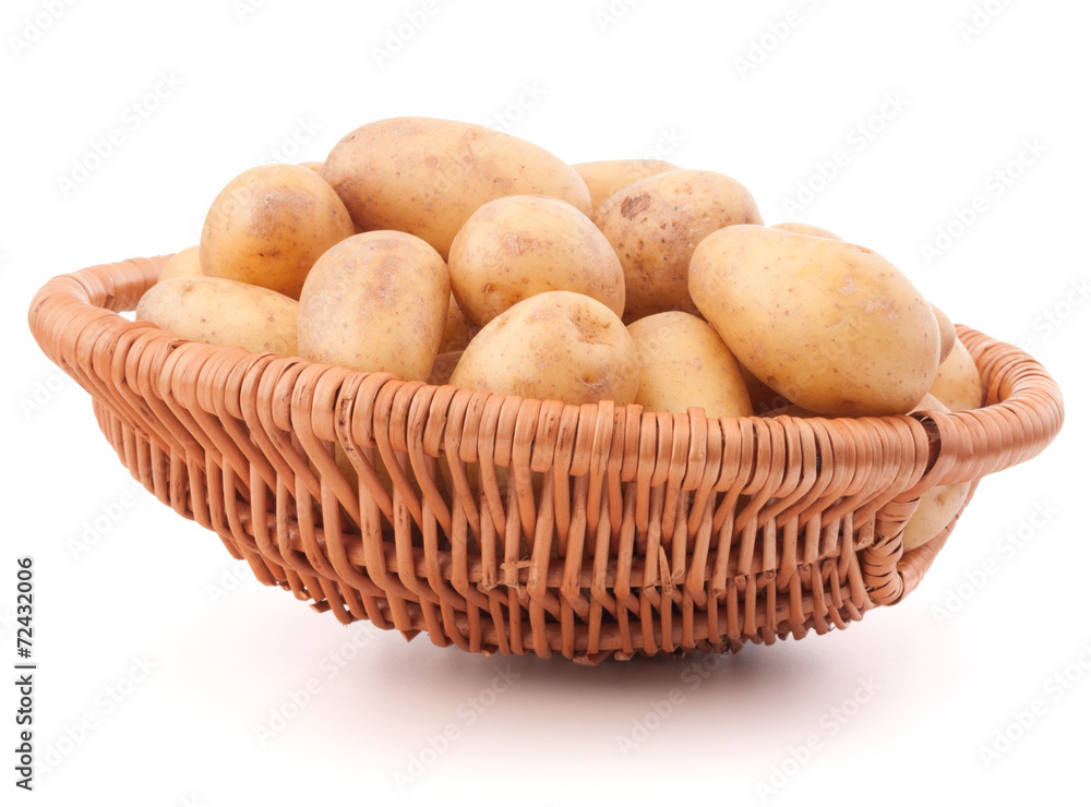 Potato tuber in wicker basket isolated on white background Potato tuber in wicker basket isolated on white background