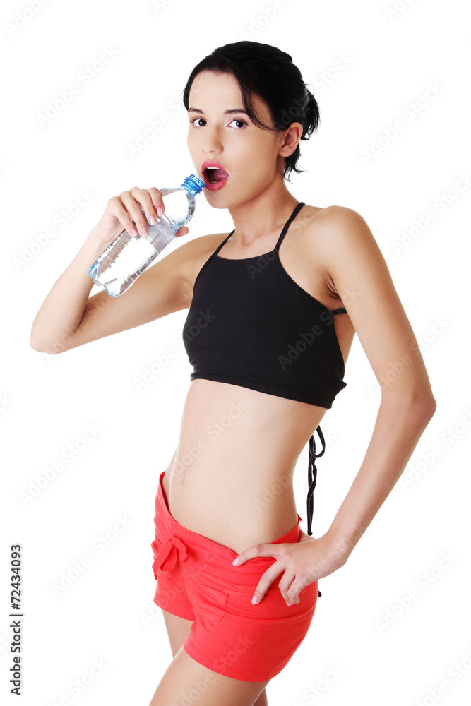 Young woman drinking water Young woman drinking water