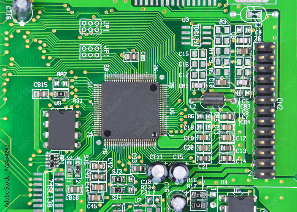 Printed computer motherboard with microcircuit, close up Printed computer motherboard with microcircuit, close up