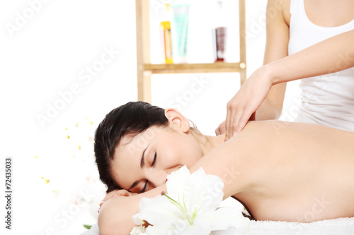 Young woman massage in spa