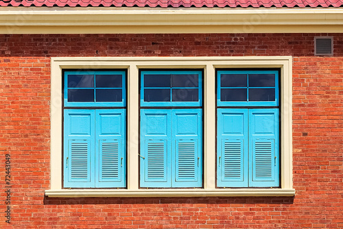 Blue Window on Brick Wall