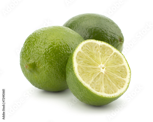Fresh lime fruit with mint leaves isolated on white background
