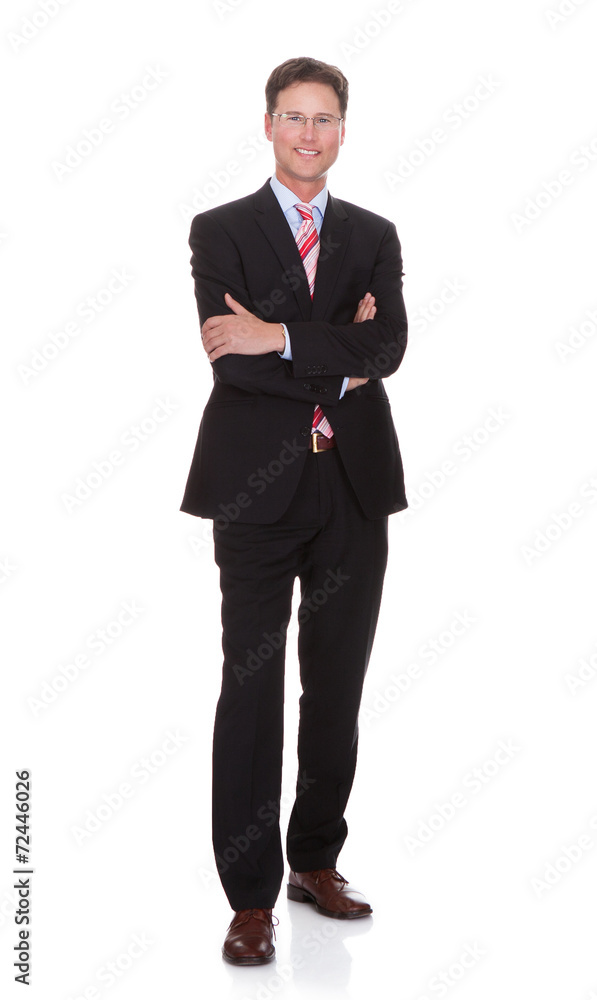 Portrait Of Confident Businessman With Arms Crossed Portrait Of Confident Businessman With Arms Crossed