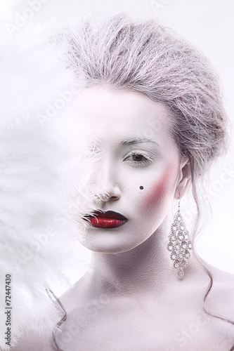 Fototapeta Naklejka Na Ścianę i Meble -  Portrait of beautiful young woman with stylish make-up