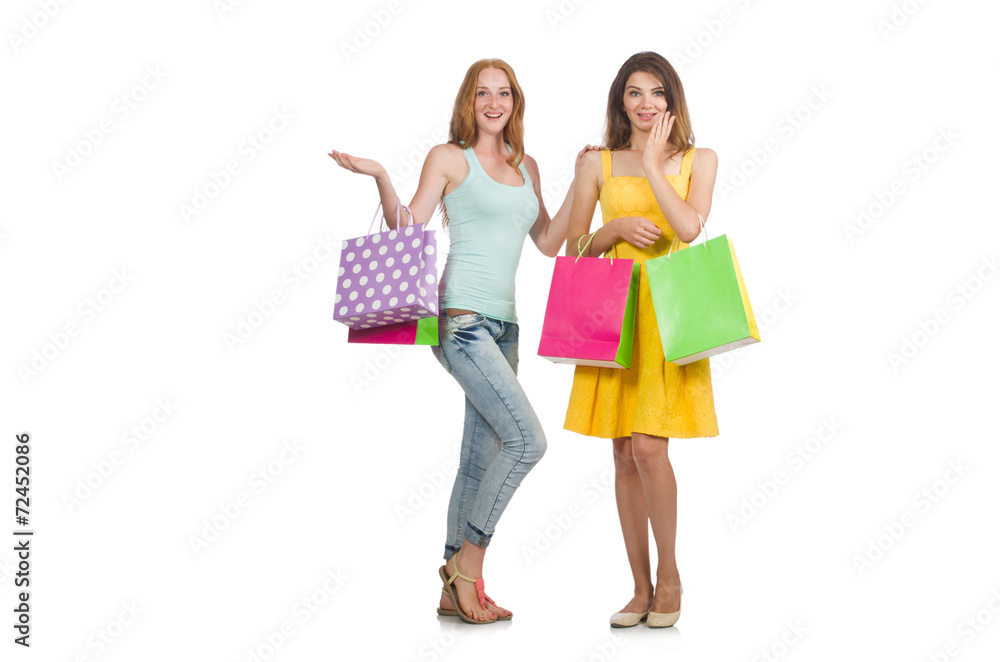 Friends with shopping bags isolated on white Friends with shopping bags isolated on white