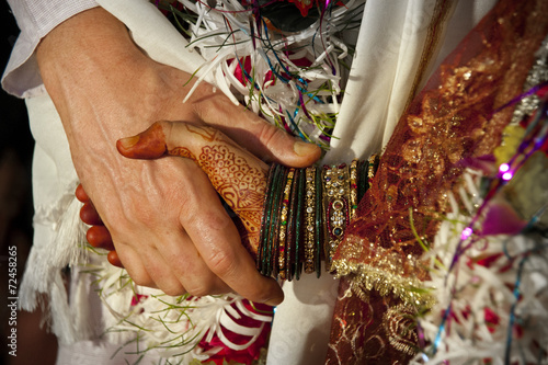 Western couple getting married in an Indian ceremony