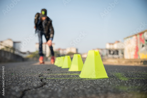 Cool man wearing roller skating shoes photo