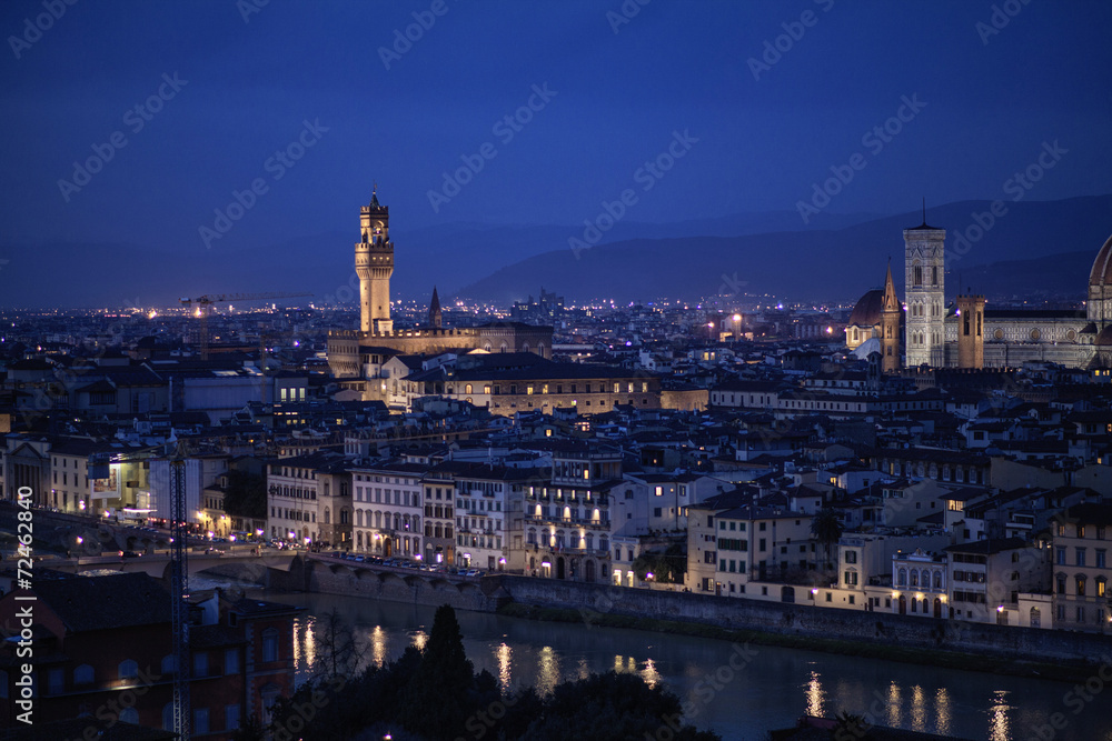 Aerial night view of Florence, Vecchio Palace, Italy