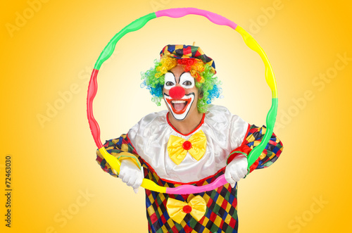 Canvas Print Clown with hula hoop isolated on white