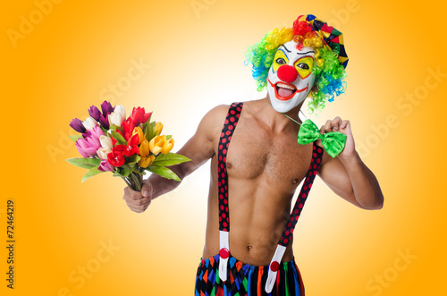 Canvas Print Clown with flowers on white