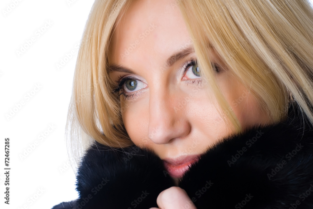 Young pretty woman in fur coat Young pretty woman in fur coat