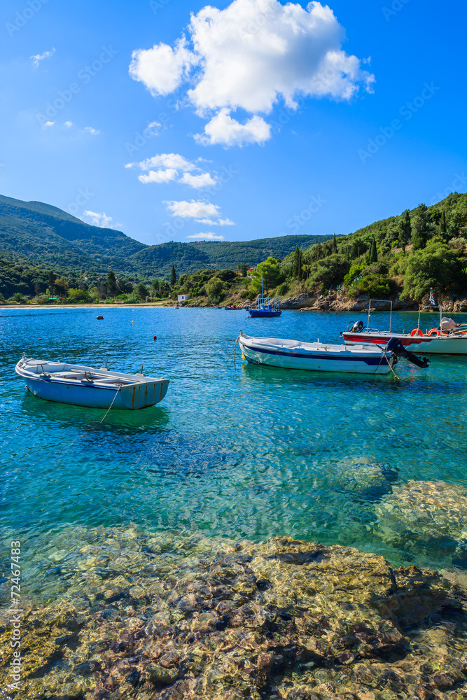 Fishing boats on sea in mountain landscape of Kefalonia island