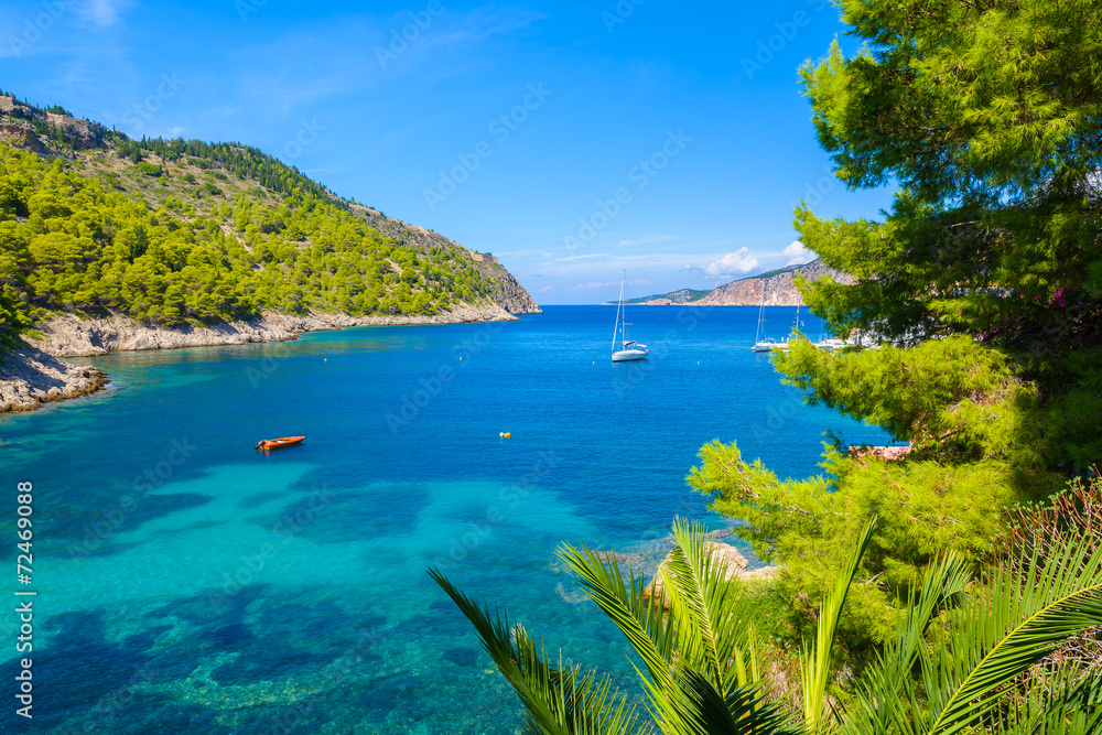 View of sea bay and palm trees in Assos town, Kefalonia island