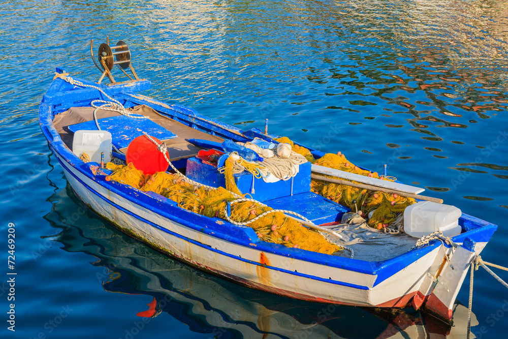 Greek fishing boat on sea in Agia Efimia port, Kefalonia island Greek fishing boat on sea in Agia Efimia port, Kefalonia island