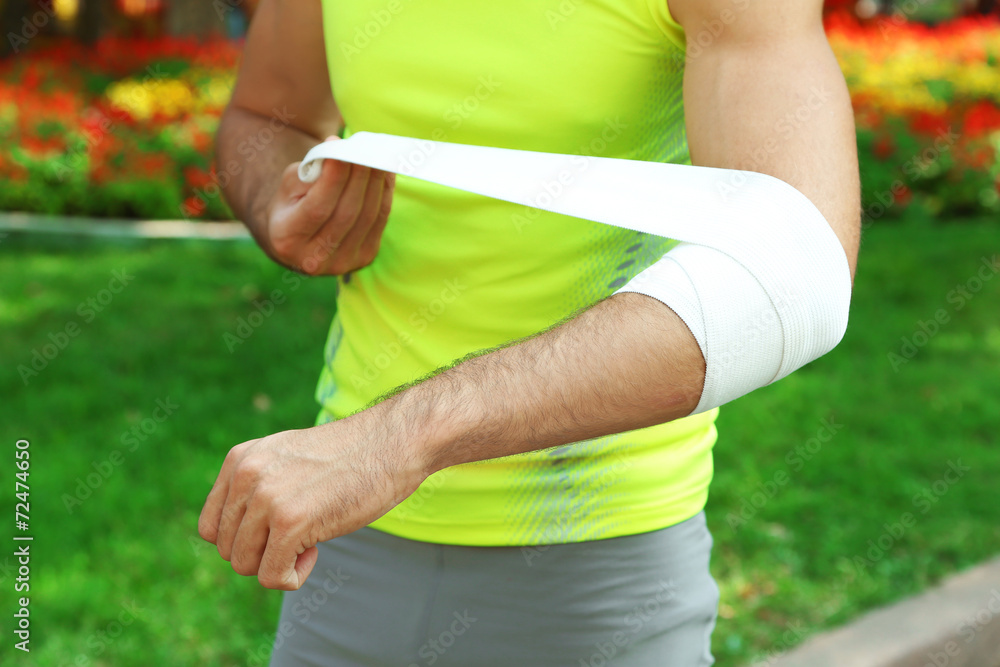 Sports injuries of man outdoors