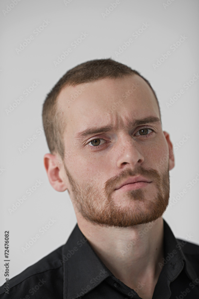 Portrait of a businessman looking at camera Portrait of a businessman looking at camera