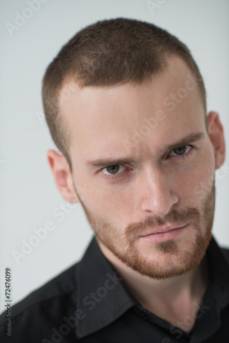 Portrait of a businessman looking at camera