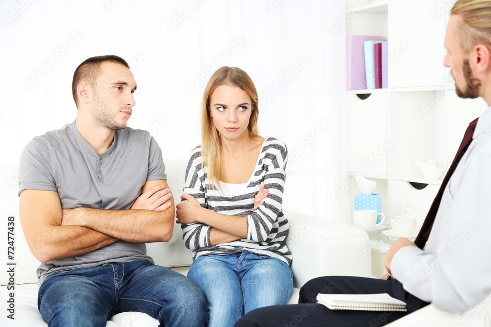 Young couple with problem on reception for family psychologist Young couple with problem on reception for family psychologist