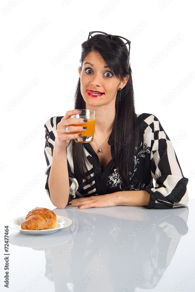 Girl having breakfast in office Girl having breakfast in office