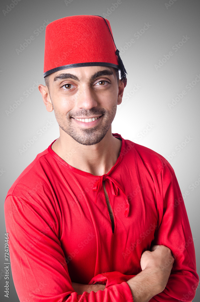 Man in traditional turkish hat and dress Man in traditional turkish hat and dress