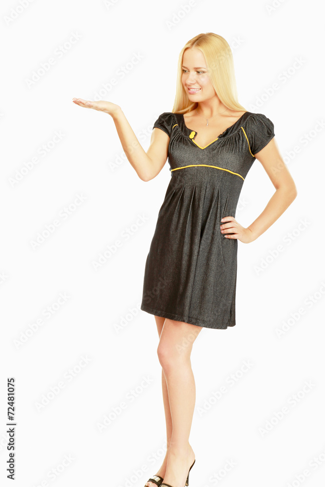 A young woman showing something A young woman showing something