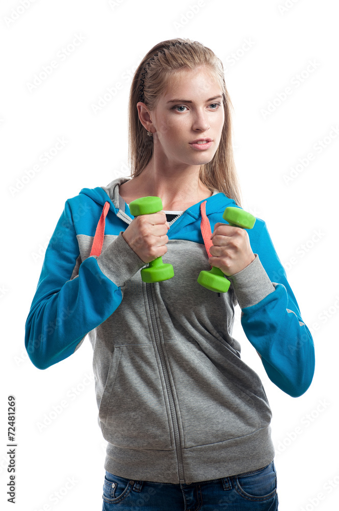 The girl with dumbbells on a white background The girl with dumbbells on a white background