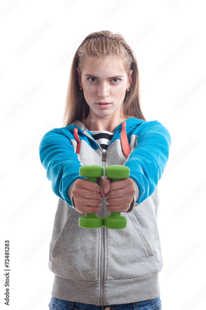 The girl with dumbbells on a white background The girl with dumbbells on a white background