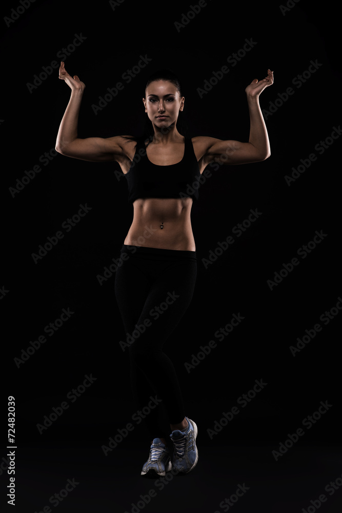 Fototapeta premium Young sports-looking nice lady with dark hair