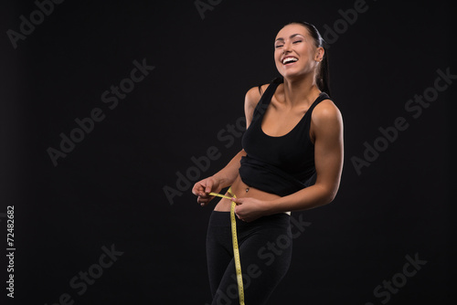 Young sports-looking nice lady with dark hair