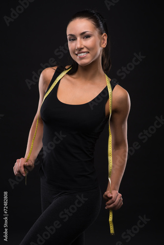 Young sports-looking nice lady with dark hair © bondarchik