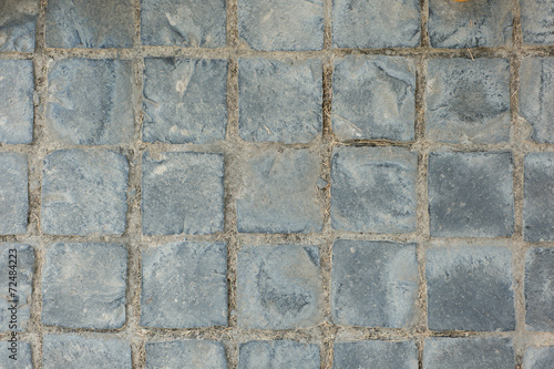 Texture of exposed cement floor tiled.