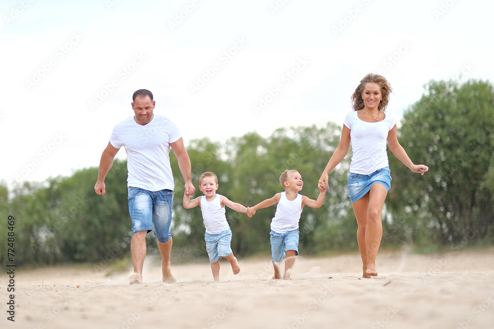 portrait of a happy family in summer nature portrait of a happy family in summer nature
