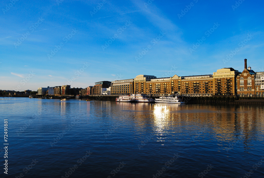 Butler's Wharf across a Calm River Thames
