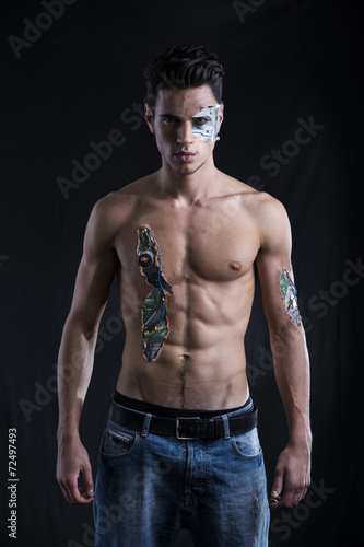 Close up Attractive Bare Muscled Man with Robotic Skin Art photo