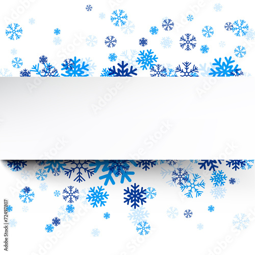 Paper card over blue snowflakes.