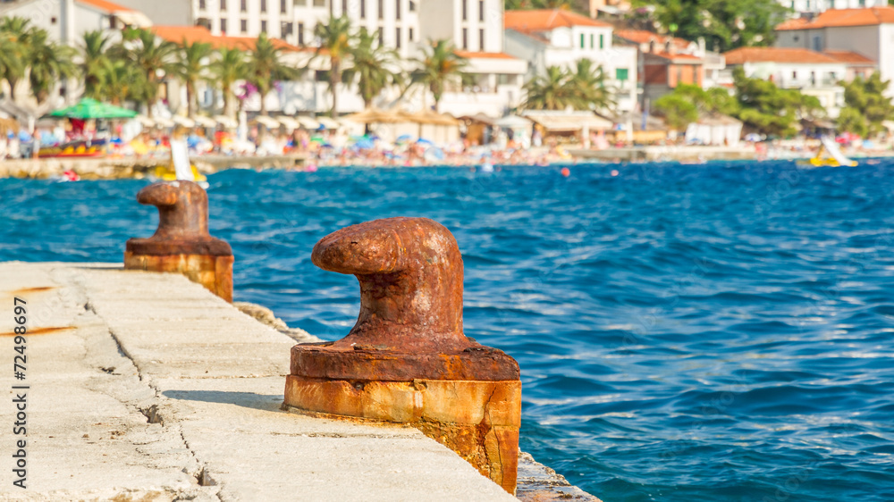 two abandoned iron rusty piers in a mediterrean harbor two abandoned iron rusty piers in a mediterrean harbor