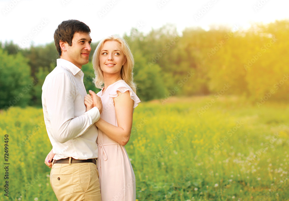 Lovely young couple in love outdoors in summer day Lovely young couple in love outdoors in summer day