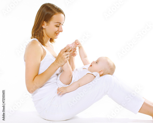 Mother and child playing and having fun on a white background
