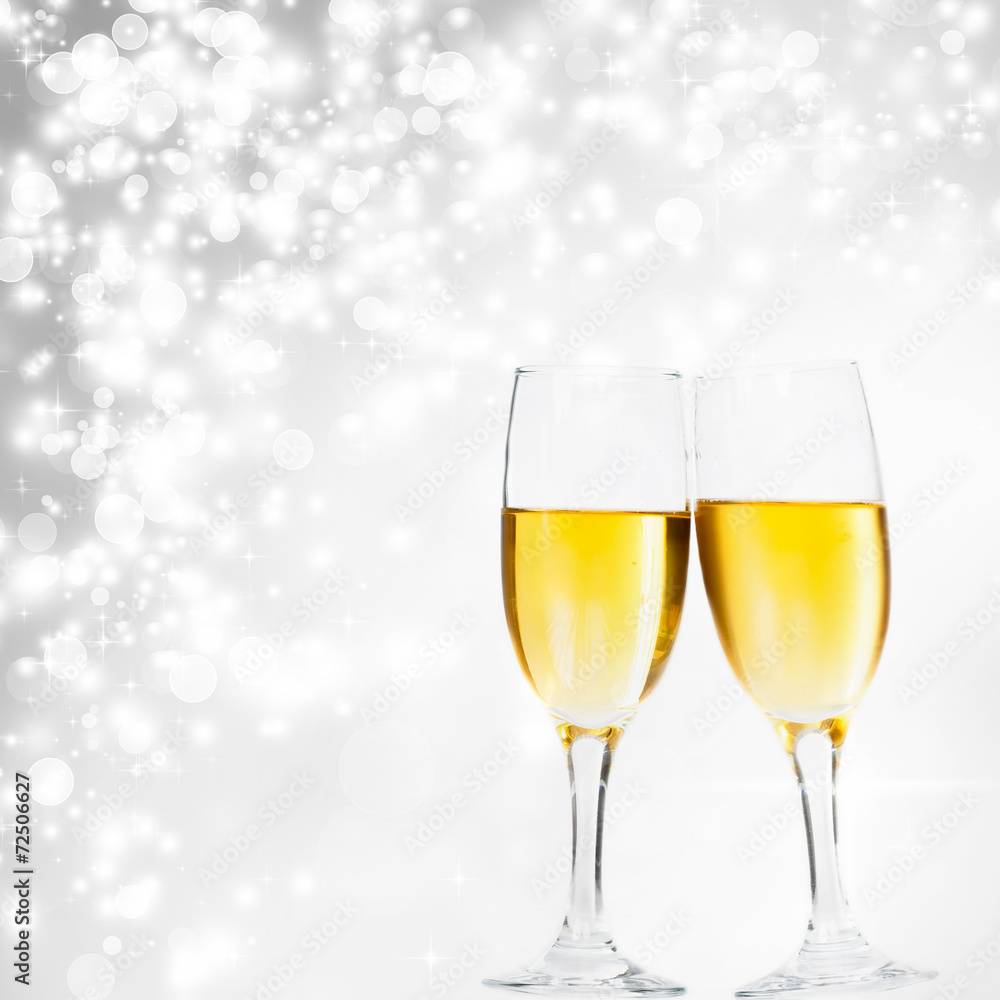 Glasses with champagne against fireworks Glasses with champagne against fireworks