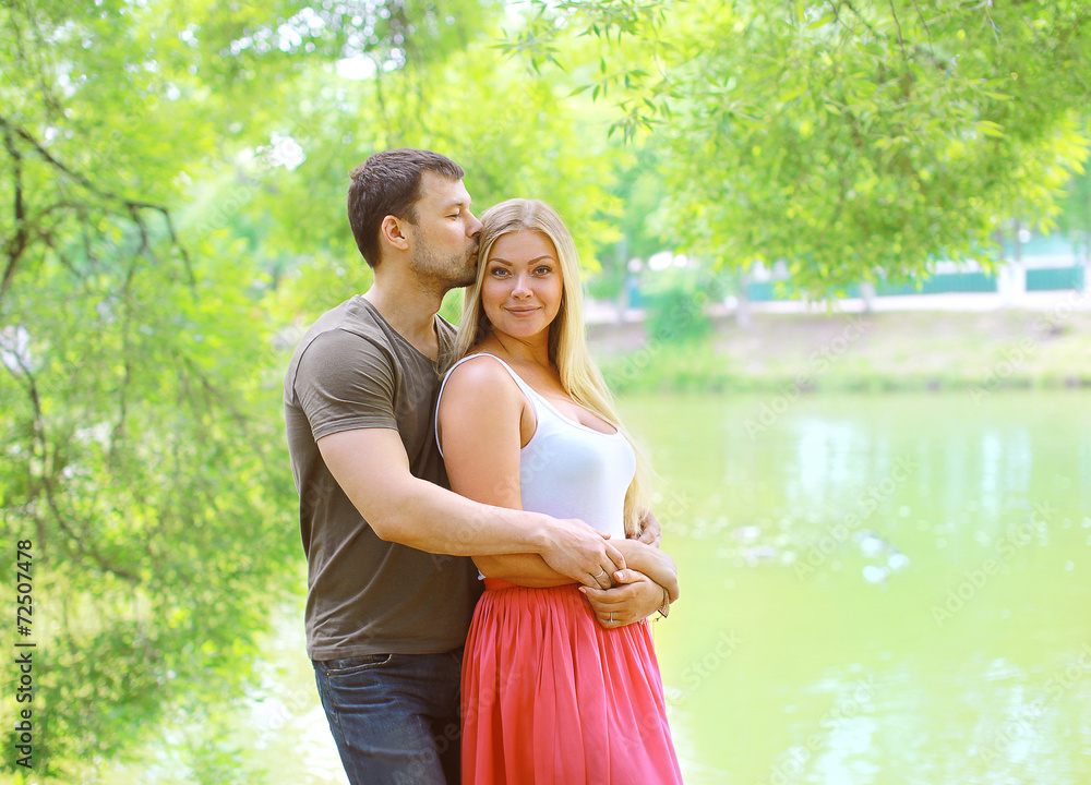 Fototapeta premium Pretty couple in love outdoors in summer day