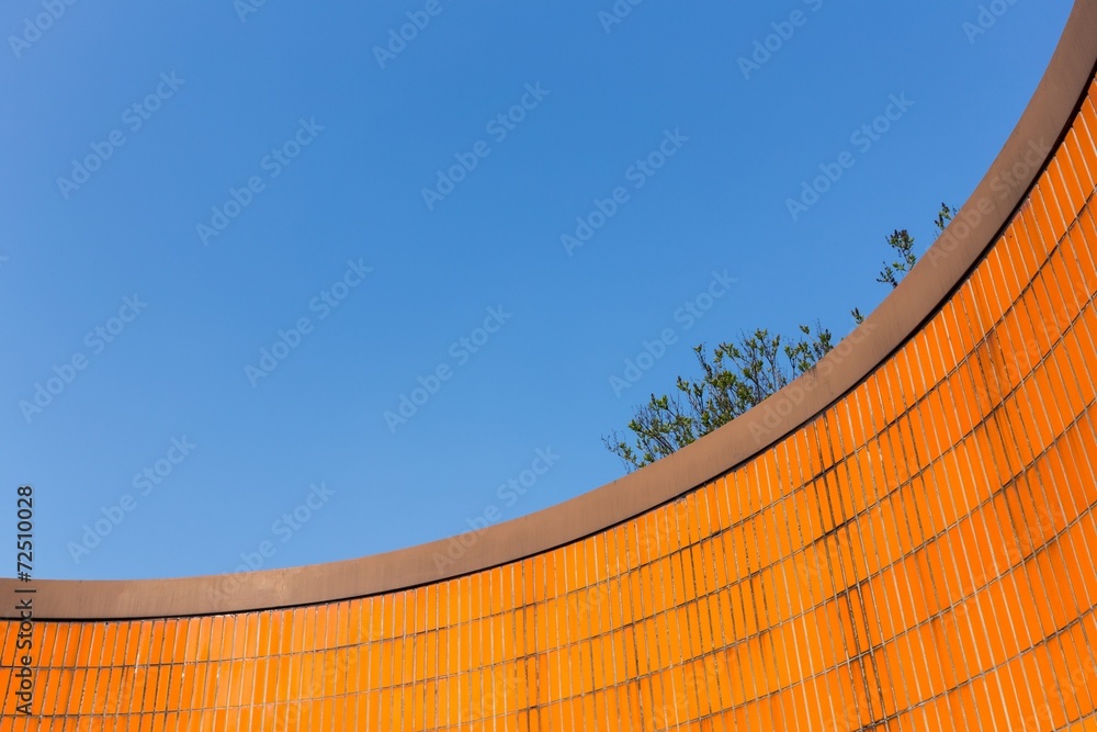 Vibrant Orange Tiles and Blue Sky