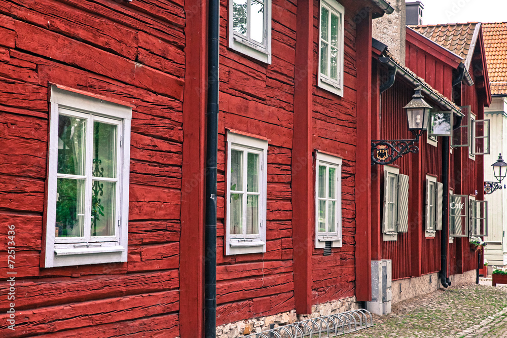 Typical red houses in open air museum Wadkoping - Orebro, Sweden