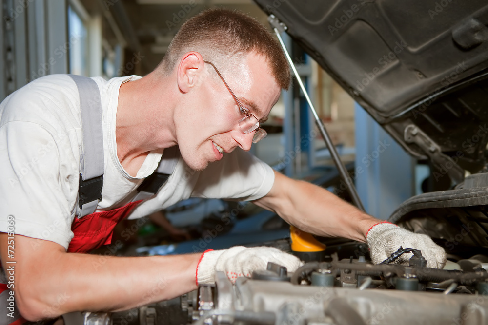 auto mechanic at work auto mechanic at work