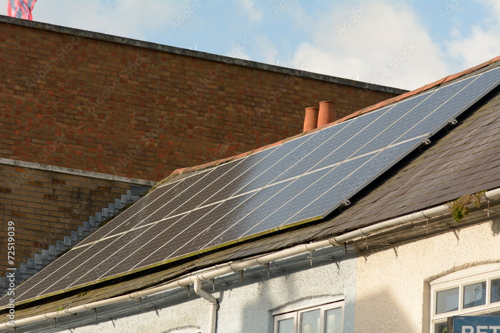 Fototapeta premium Solar panels on building roof