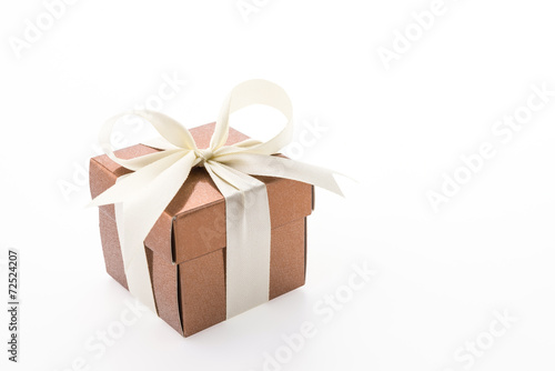 Gold gift box isolated on white background