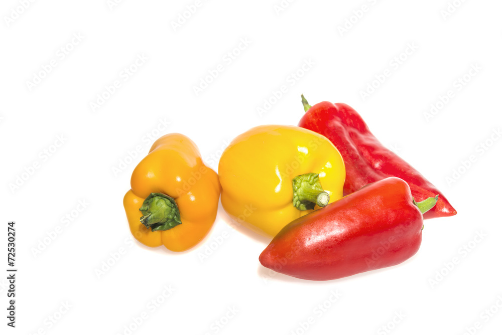 Multicolor peppers on a white background Multicolor peppers on a white background