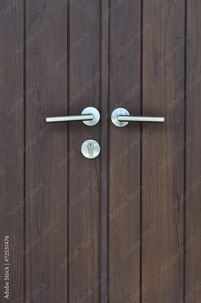 Obraz premium door handle on the brown door