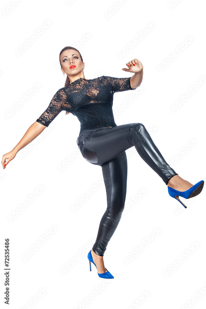 Woman in blue shoes makes a big step. Woman in blue shoes makes a big step.